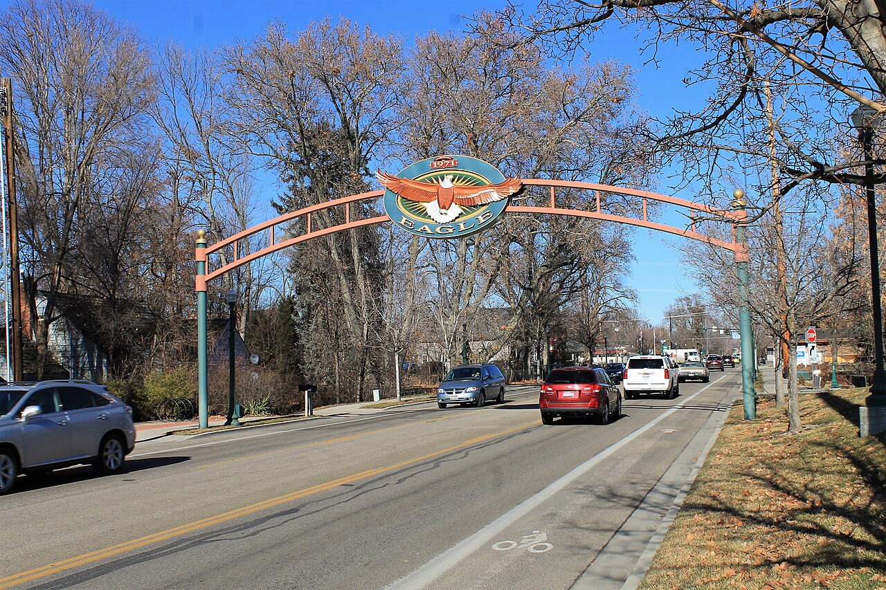 The arched City of Eagle sign over a street in Eagle, Idaho.